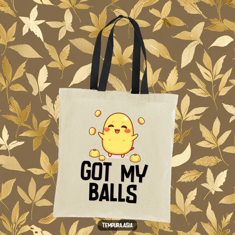 Funny tamagoyaki character giggling while juggling rice balls on a tote bag, a humorous and practical accessory.