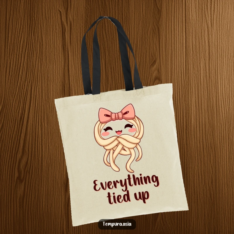 Funny udon tote bag showcasing a cheerful noodle tying itself into a playful bow, practical and humorous.